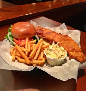 Legends Fish Sandwich, fries, and Cole slaw.